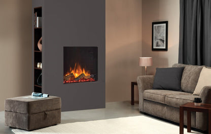 Living room with a gray electric fireplace, beige sofa, and side table.