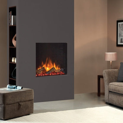 Living room with a gray electric fireplace, beige sofa, and side table.