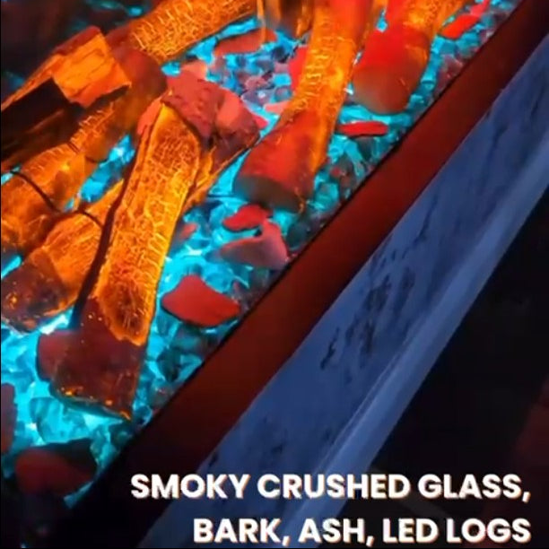 Aqua Bleu Aquarium Blue fuel effect with smoky crushed glass, bark, ash, and LED Orange logs.