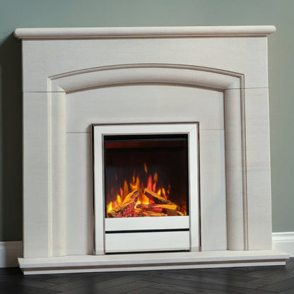 A Wildfire Ravel 400e Electric Fire Nickel and Black insert with a faux flame effect, set within a white mantel against a sage green wall.