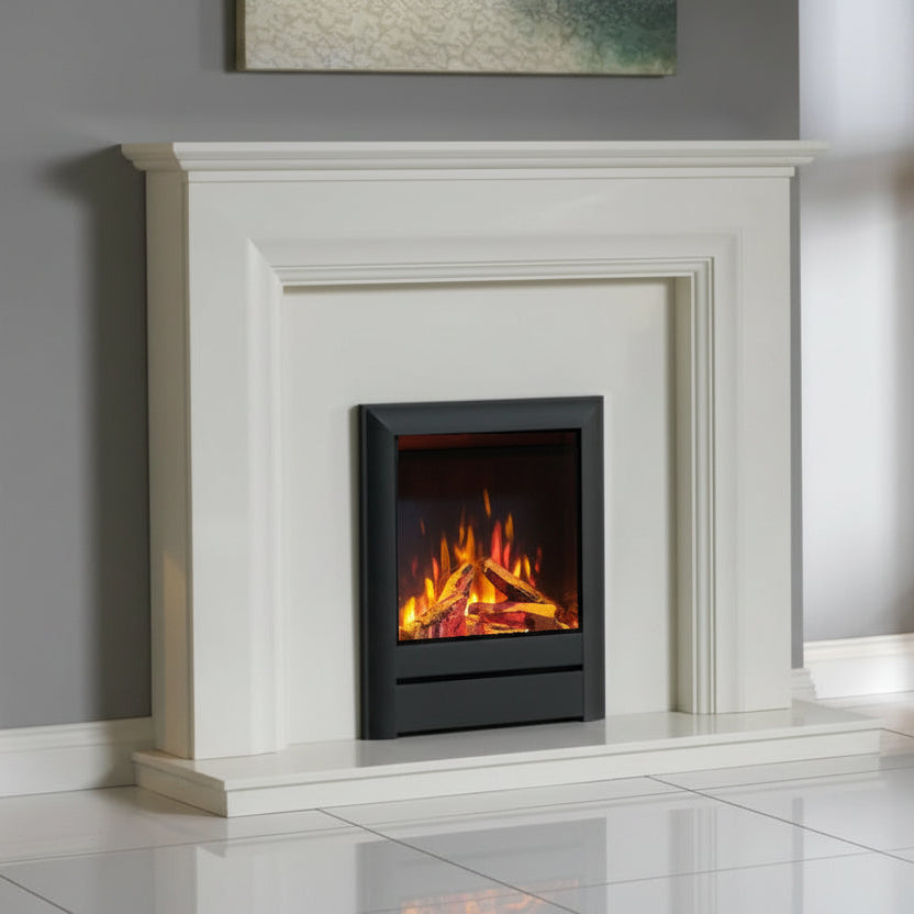 A modern Wildfire Ravel 400e Electric Fire in Anthracite,  insert with realistic orange and yellow flames, set within a white fireplace mantel. 