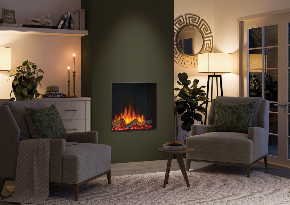 Living room with a wall-mounted electric fireplace, gray sofa, and armchair.