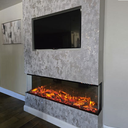 Modern Flamora PR1500 electric media wall fireplace with a television above it in a living room setting.