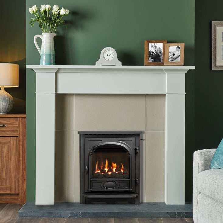 Fireplace with a lit fire in a living room setting with Logic He Stockton Coal Inset Fire
