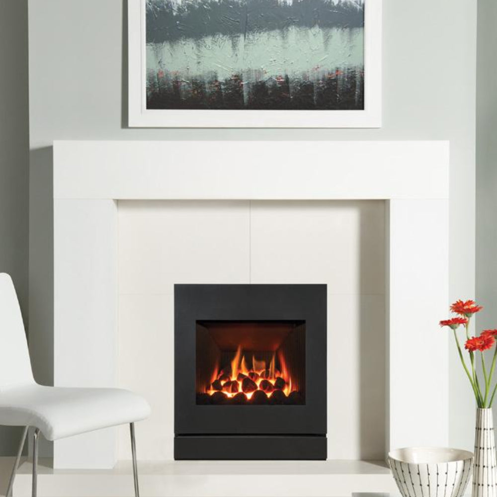 Modern electric fireplace in a white room with decorative elements.