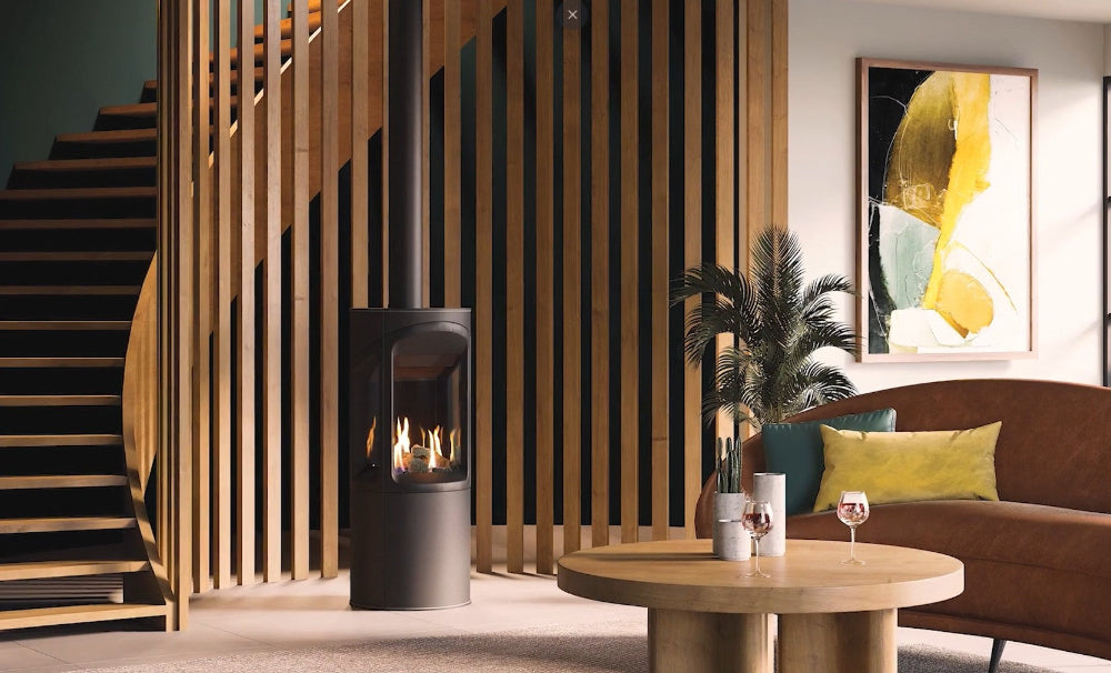 Modern living room with a fireplace, table, and decorative elements with the Onyx Liv 3 Gas Stove High Efficiency Gas Stove Ireland Contemporary Log Effect Gas Stove