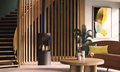Modern living room with a fireplace, table, and decorative elements with the Onyx Liv 3 Gas Stove High Efficiency Gas Stove Ireland Contemporary Log Effect Gas Stove