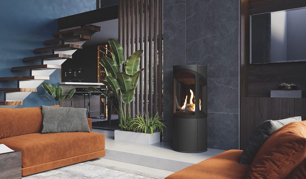 Onyx Liv 3 Gas Stove High Efficiency Gas Stove Ireland Contemporary Log Effect Gas Stove in a Modern living room with a fireplace, brown sofa, and decorative plants.