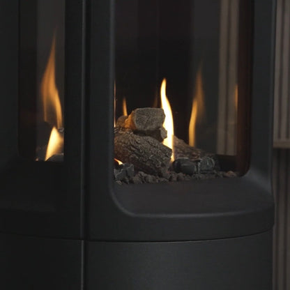 Close-up of a modern fireplace with flames and logs inside from the Onyx Liv 3 Gas Stove High Efficiency Gas Stove Ireland Contemporary Log Effect Gas Stove