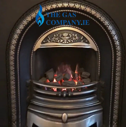 TheGasCompany.ie Photo of The Fully Requential Remote Controlled Inset Gas Fire in a cast Iron Arched Fireplace