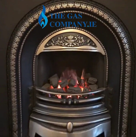 TheGasCompany.ie Photo of The Fully Requential Remote Controlled Inset Gas Fire in a cast Iron Arched Fireplace
