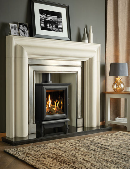 Sheraton Gas Stove in Modern fireplace with decorative cream mantel and side table in a olive green living room setting