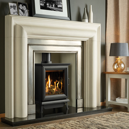 Sheraton Gas Stove in Modern fireplace with decorative cream mantel and side table in a olive green living room setting