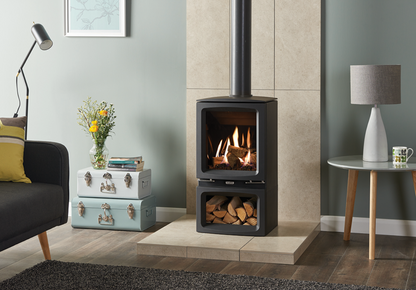 Gazco Vogue Midi Midline with Log Box in Modern living room with a freestanding stove, gray walls, and decorative elements.