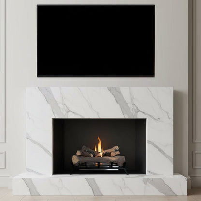 Modern fireplace with marble surround and television above in a neutral room.